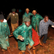 Members of the National Youth Service carry away a dead body covered in a blanket during the early hours of Thursday, May 10, 2018 near Solai, in Kenya's Rift Valley. Water burst through the banks of the Patel Dam in Nakuru County late Wednesday night after heavy rains, sweeping away hundreds of homes and killing dozens.